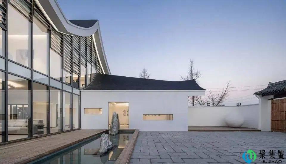 为何高端商务大厦幕墙、高档住宅门窗都爱用Low-E玻璃?